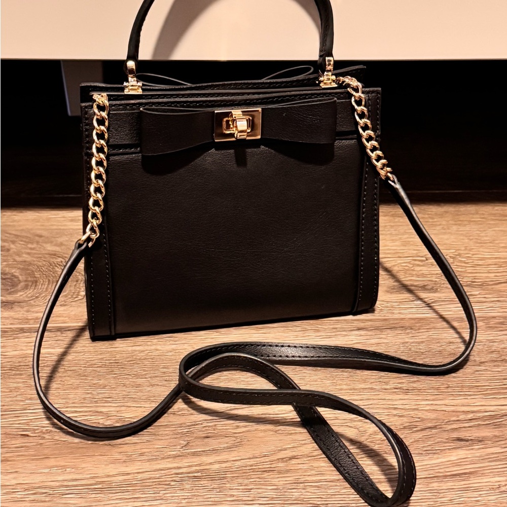 Elegant Black kate spade Handbag with Gold Accents top handle and cross body
